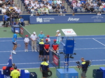 Ceremonial tossup on the Centre Court with Alex DE MINAUR on the left side of the net and Jannik SINNER (ITA) on the right side.