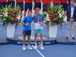 National Bank Open presented by Rogers 2023 Champion Jannick Sinner and the Runner-up Alex De Minaur holding their Trophies 