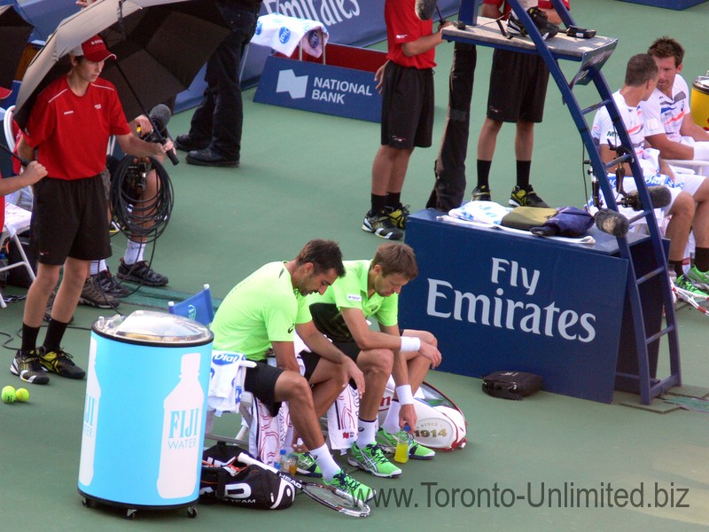 Nedad Zimjonic (SRB) and Daniel Nestor (CDN) during change over. Stadium Court August 9, 2014 Rogers Cup Toronto