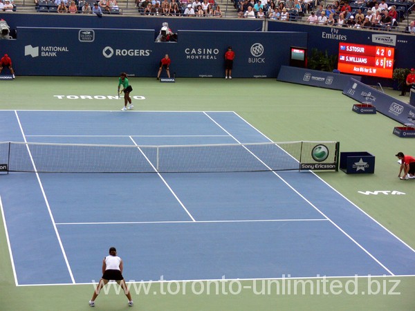 Samantha Stosur and Serena Williams on Centre Court