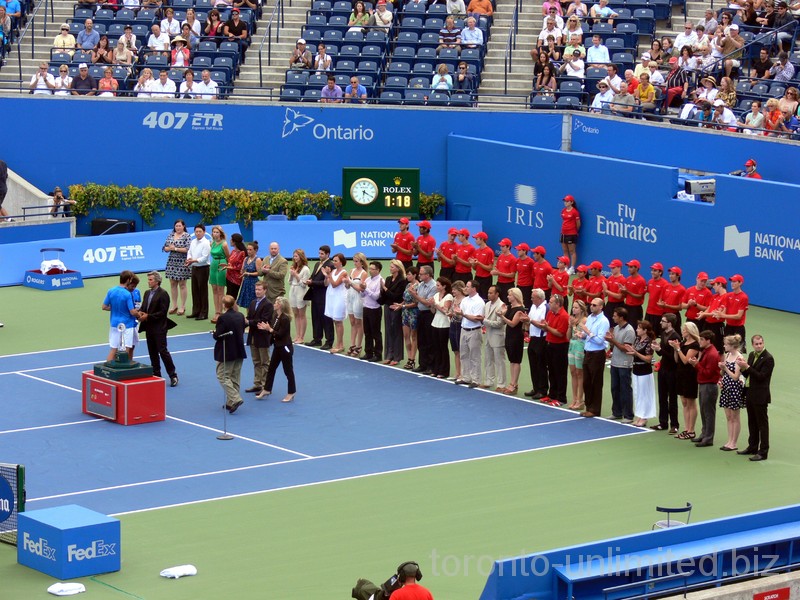 Doubles Championship closing ceremony. Marcell Granollers and Marc lopez are presented with runnersup trophy form Karl Hale, Tournament Director. August 19, 2012 Rogers Cup.