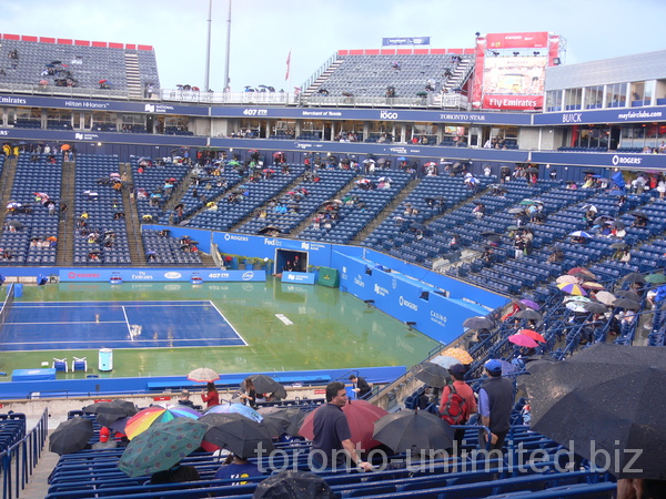 Many spectators stayed with their rain gear. August 11, 2012 Rogers Cup.