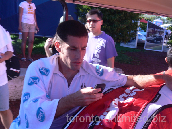 Flavio Cipolla with his Smart phone, after the match August 6, 2012, Rogers Cup.