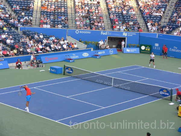 Victor Troicki is serving to Milos Raonic on Central Court, August 7, 2012 Rogers Cup.