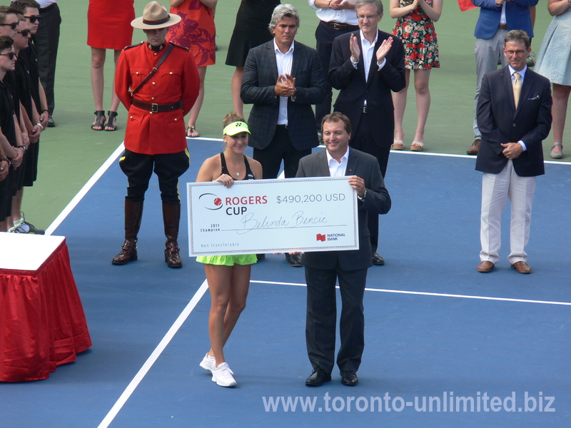 Belinda Bencic presented with a Champions cheque for $490,200 US by Ghislain Parent  Chief Financial Officer of National Bank 16 August 2015 Rogers Cup Toronto.