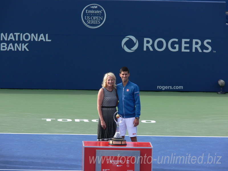 Novak Djokovic posing with Karen Leggett of National Bank 31 July 2016 Rogers Cup