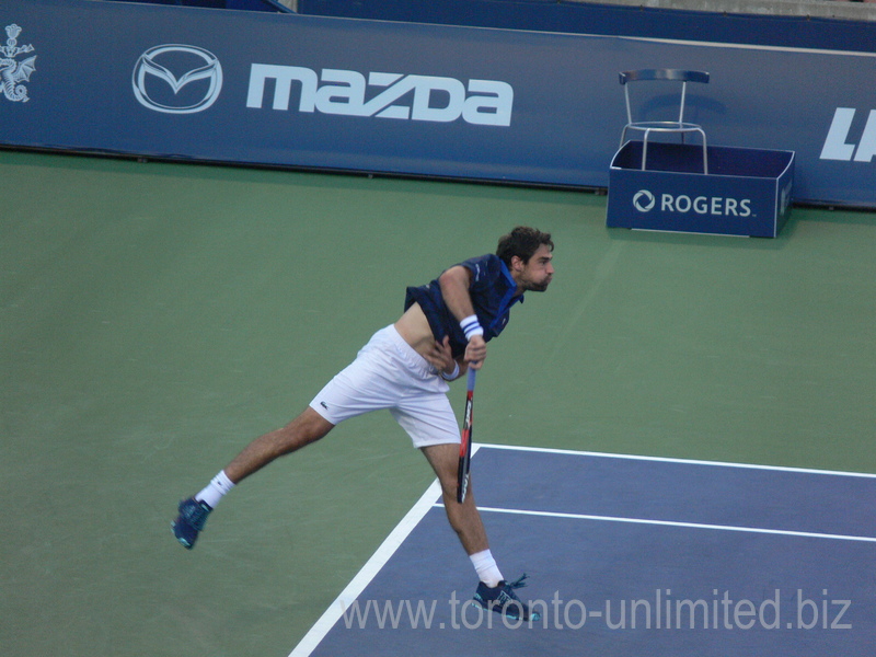 Jeremy Chardy (FRA) serving on Centre Court to Vasek Pospisil (CAN) 26 July 2016 Rogers Cup in Toronto