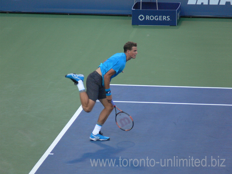 Vasek Pospisil (CDN) serving to Jeremy Chardy (FRA) on Centre Court 26 July 2016 Rogers Cup in Toronto