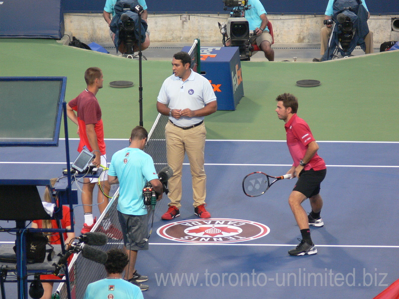 Mikhail Youzhny (RUS) and Stan Wawrinka (SUI) with coin-toss on Centre Court 26 July 2016 Rogers Cup in Toronto
