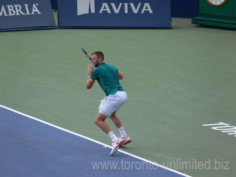 Jack Sock is playing at the baseline against Stan Wawrinka (SUI) on Central Court 28 July 2016 Rogers Cup in Toronto