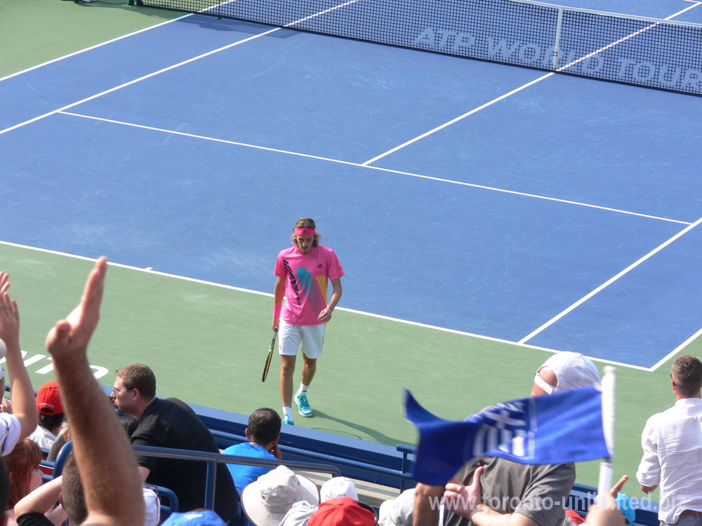Stephanos Tsitsipas and the Greek flag with a spectator. Rogers cup August 11, 2018 Toronto!