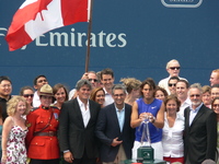 Rafael Nadal and Rogers Cup 2008 organizers posing for picture. 