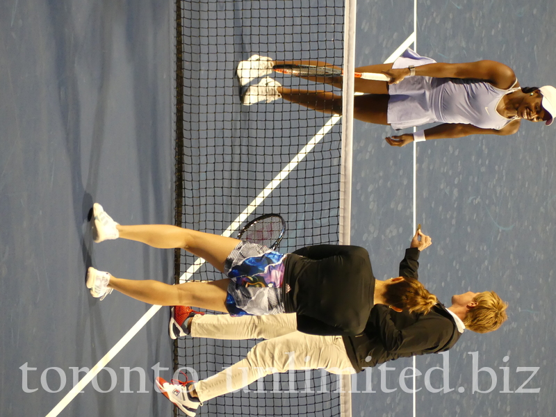 Sloane STEPHENS USA and Maria SAKKARI GRE and Umpire showing the coin for the toss on Stadium Court August 9, 2022.