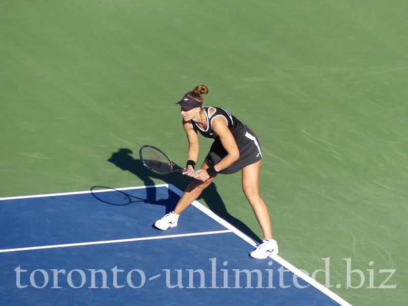 Beatriz HADDAD MAIA BRA returning the serve on Stadium Court August 11, 2022 