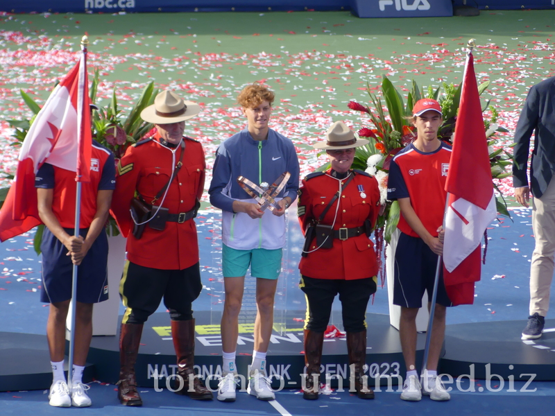 Champion Jannik Sinner with RCMP Honor Guard