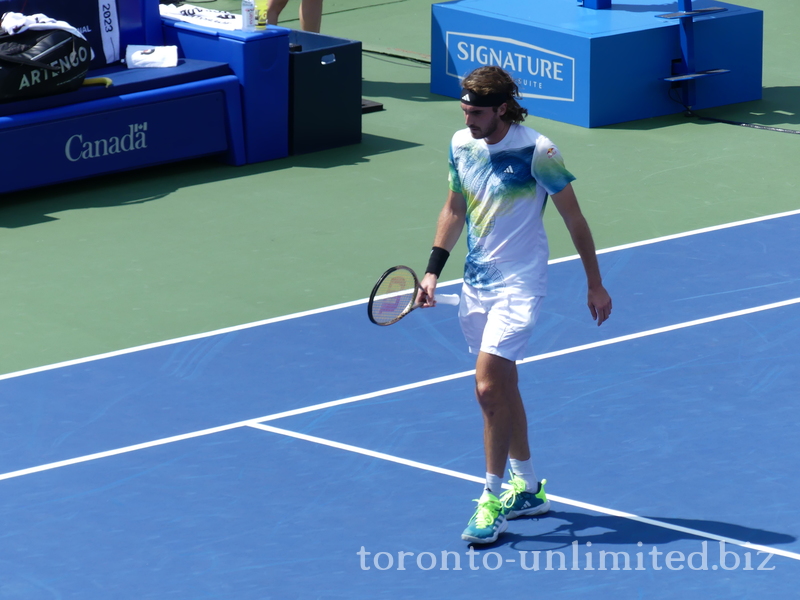 Stefanos Tsitsipas walking on the Centre Court