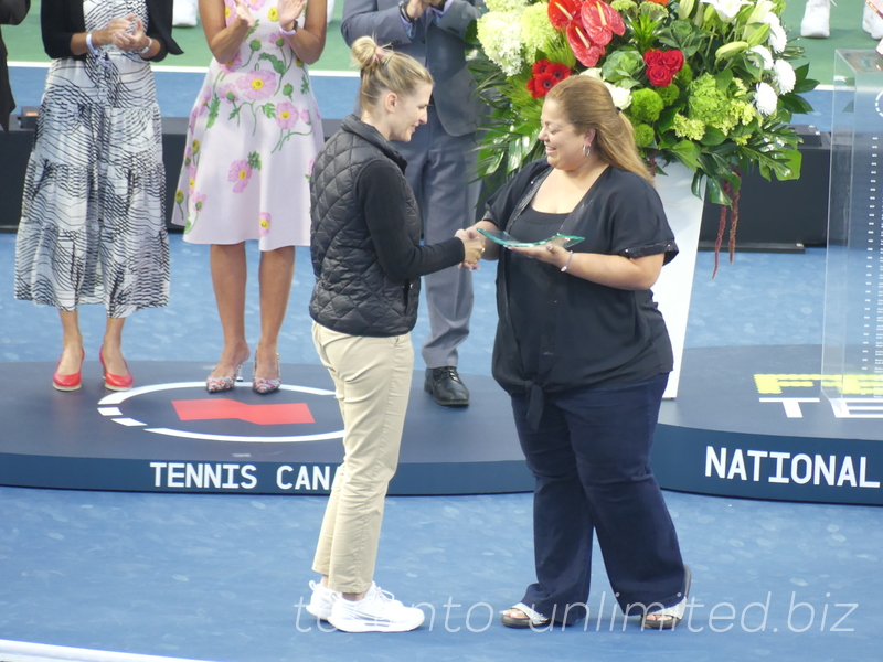 Lisa Mary to present Chair Umpire  Eva Asderaki-Moore  with token of our appreciation from Tennis Canada and National Bank Open