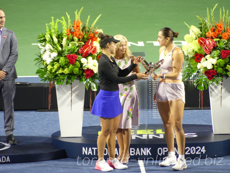 Caroline Dolehide (USA) and Desirae Krawczyk (USA) with Collette Watson