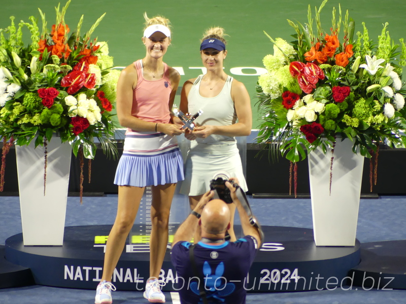 Champions Caroline Dolehide (USA) and Desirae Krawczyk (USA)