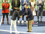 Before we introduce our Finalist Ill ask Doug to present our Chair umpire Juan Jennifer Zhang with token appreciation from Tennis Canada and National Bank.